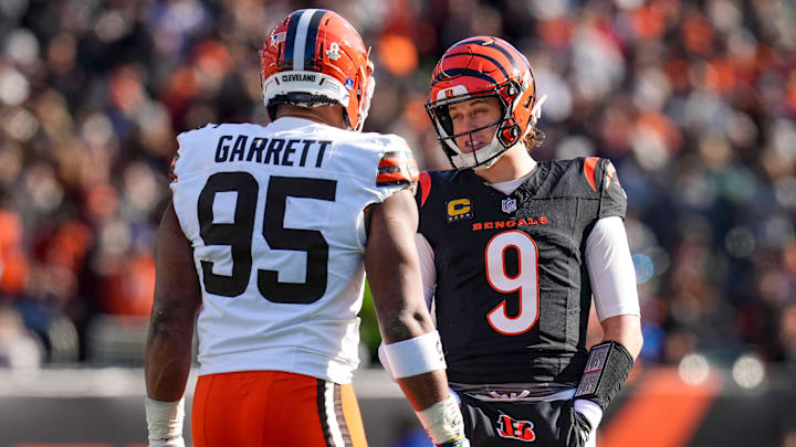 Jan 4, 2026; Cincinnati, Ohio, USA; Cincinnati Bengals quarterback Joe Burrow (9) and Cleveland Browns defensive end Myles Garrett (95) talk between plays in the first quarter at Paycor Stadium. Mandatory Credit: Sam Greene-USA TODAY Network via Imagn Images Jan 4, 2026; Cincinnati, Ohio, USA; Cincinnati Bengals quarterback Joe Burrow (9) and Cleveland Browns defensive end Myles Garrett (95) talk between plays in the first quarter at Paycor Stadium. Mandatory Credit: Sam Greene-USA TODAY Network via Imagn Images