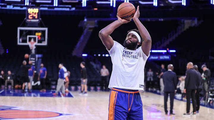Nov 26, 2023; New York, New York, USA; New York Knicks center Mitchell Robinson (23) warms up prior to the game against the Phoenix Suns at Madison Square Garden. Mandatory Credit: Wendell Cruz-Imagn Images