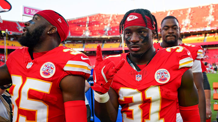 Sep 28, 2025; Kansas City, Missouri, USA; Kansas City Chiefs cornerback Jaylen Watson (35) and linebacker Jeffrey Bassa (31) leave the field against the Baltimore Ravens after game at GEHA Field at Arrowhead Stadium. Mandatory Credit: Denny Medley-Imagn Images