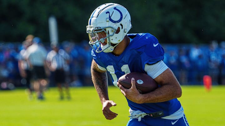 July 31, 2023; Westfield, IN, USA; Indianapolis Colts wide receiver Michael Pittman Jr. (11) runs
