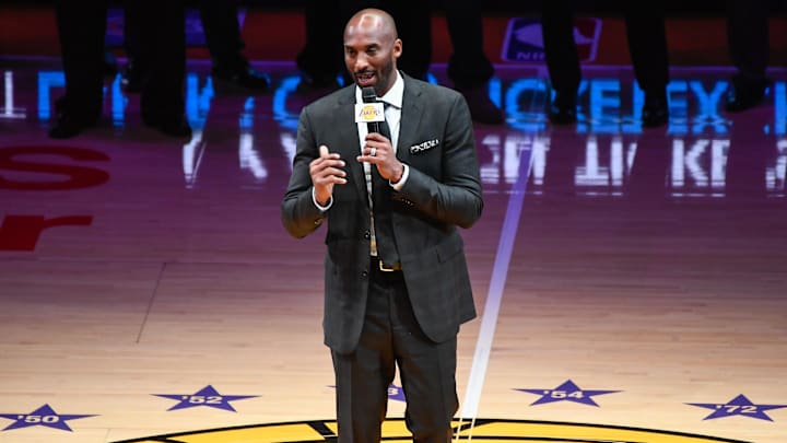 Dec 18, 2017; Los Angeles, CA, USA; Kobe Bryant addresses the Staples Center crowd during a halftime ceremony to retire his two uniforms numbers, 8 and 24. Mandatory Credit: Robert Hanashiro-Imagn Images