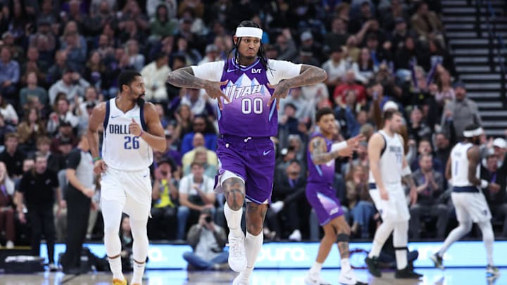 Nov 14, 2024; Salt Lake City, Utah, USA; Utah Jazz guard Jordan Clarkson (00) reacts to making a three point shot against the Dallas Mavericks during the third quarter at Delta Center. Mandatory Credit: Rob Gray-Imagn Images