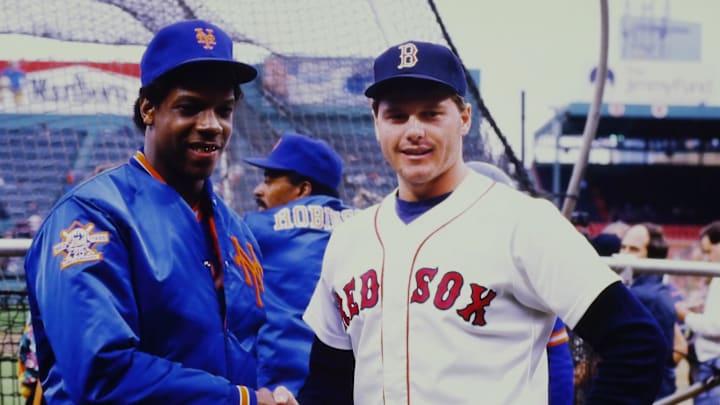 New York Mets Dwight Gooden and Boston Red Sox Roger Clemens shaking hands and smilin