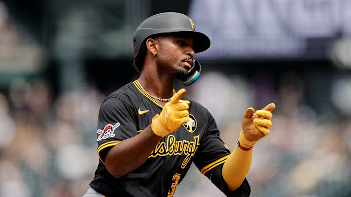 Aug 2, 2025; Denver, Colorado, USA; Pittsburgh Pirates first baseman Liover Peguero (31) gestures as he rounds the bases on a three run home run in the fifth inning against the Colorado Rockies at Coors Field. Mandatory Credit: Isaiah J. Downing-Imagn Images
