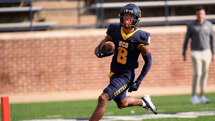 UCO's Terrill Davis (8) scores a touchdown in the first half of the college football game between the University of Oklahoma Bronchos and the Emporia State Hornets at Chad Richison Stadium in Edmond, Okla., Saturday, Nov. 16, 2024. UCO's Terrill Davis (8) scores a touchdown in the first half of the college football game between the University of Oklahoma Bronchos and the Emporia State Hornets at Chad Richison Stadium in Edmond, Okla., Saturday, Nov. 16, 2024.