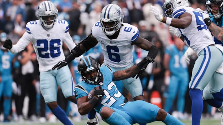 Carolina Panthers running back Trevor Etienne gets a first down during the second half against the Dallas Cowboys.