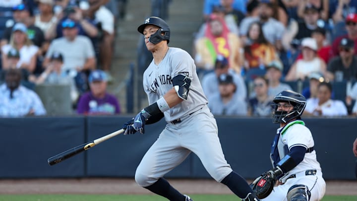 New York Yankees right fielder Aaron Judge (99) hits an rbi single against the Tampa Bay Rays in the ninth inning at George M. Steinbrenner Field on April 19. New York Yankees right fielder Aaron Judge (99) hits an rbi single against the Tampa Bay Rays in the ninth inning at George M. Steinbrenner Field on April 19.