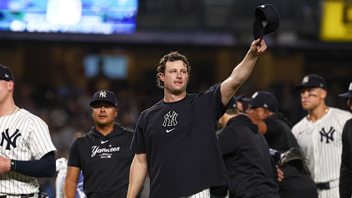 Sep 26, 2024; Bronx, New York, USA; New York Yankees starting pitcher Gerrit Cole (45) waves to fans after defeating the Baltimore Orioles to clinch the American League East title at Yankee Stadium. Mandatory Credit: Vincent Carchietta-Imagn Images Sep 26, 2024; Bronx, New York, USA; New York Yankees starting pitcher Gerrit Cole (45) waves to fans after defeating the Baltimore Orioles to clinch the American League East title at Yankee Stadium. Mandatory Credit: Vincent Carchietta-Imagn Images