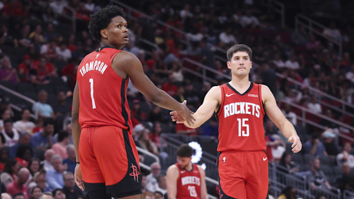 Mar 10, 2026; Houston, Texas, USA; Houston Rockets guard Amen Thompson (1) and guard Reed Sheppard (15) celebrate after a play during the fourth quarter against the Toronto Raptors at Toyota Center. Mandatory Credit: Troy Taormina-Imagn Images