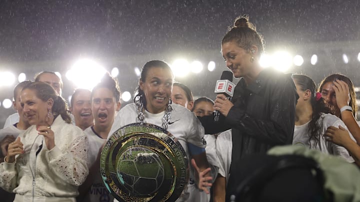 Oct 6, 2024; Orlando, Florida, USA; Orlando Pride forward Marta (10) holds the 2024 NWSL Shield awarded to them at the end of their match against Washington Spirit at Inter&Co Stadium. Mandatory Credit: Mike Watters-Imagn Images