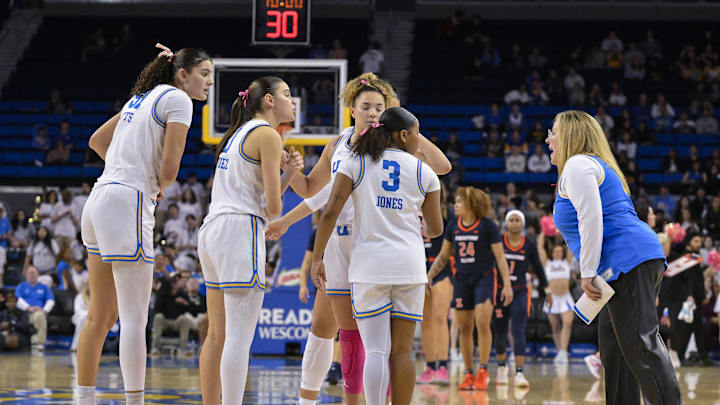 Feb 20, 2025; Los Angeles, California, USA; UCLA Bruins head coach Cori Close talks to her players center Lauren Betts (51), guard Gabriela Jaquez (11), guard Kiki Rice (1) and guard Londynn Jones (3) during the fourth quarter at Pauley Pavilion presented by Wescom. Mandatory Credit: Robert Hanashiro-Imagn Images Feb 20, 2025; Los Angeles, California, USA; UCLA Bruins head coach Cori Close talks to her players center Lauren Betts (51), guard Gabriela Jaquez (11), guard Kiki Rice (1) and guard Londynn Jones (3) during the fourth quarter at Pauley Pavilion presented by Wescom. Mandatory Credit: Robert Hanashiro-Imagn Images