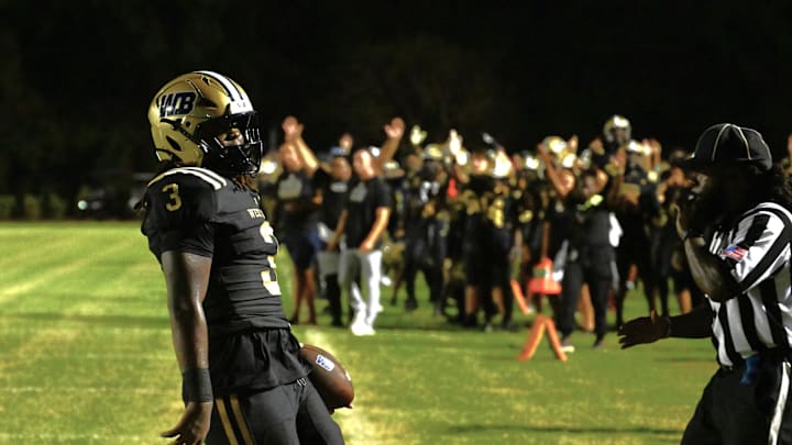 West Boca Raton football's Javian Mallory (3) scores a touchdown during a win over Benjamin on Thursday, Aug. 22, 2024. West Boca Raton football's Javian Mallory (3) scores a touchdown during a win over Benjamin on Thursday, Aug. 22, 2024.