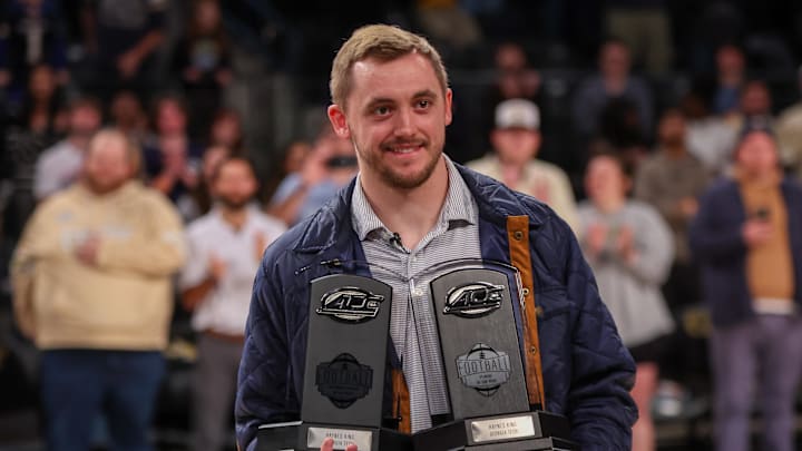 Dec 16, 2025; Atlanta, Georgia, USA; Georgia Tech Yellow Jackets quarterback Haynes King (10) receives awards during halftime of a game against the Marist Red Foxes at McCamish Pavilion. Mandatory Credit: Brett Davis-Imagn Images
Dec 16, 2025; Atlanta, Georgia, USA; Georgia Tech Yellow Jackets quarterback Haynes King (10) receives awards during halftime of a game against the Marist Red Foxes at McCamish Pavilion. Mandatory Credit: Brett Davis-Imagn Images