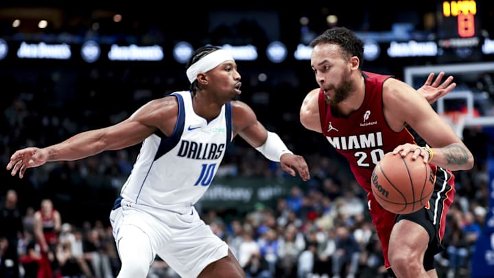 Feb 13, 2025; Dallas, Texas, USA; Miami Heat forward Kyle Anderson (20) drives to the basket as Dallas Mavericks guard Brandon Williams (10) defends during the second half at American Airlines Center. Mandatory Credit: Kevin Jairaj-Imagn Images Feb 13, 2025; Dallas, Texas, USA; Miami Heat forward Kyle Anderson (20) drives to the basket as Dallas Mavericks guard Brandon Williams (10) defends during the second half at American Airlines Center. Mandatory Credit: Kevin Jairaj-Imagn Images