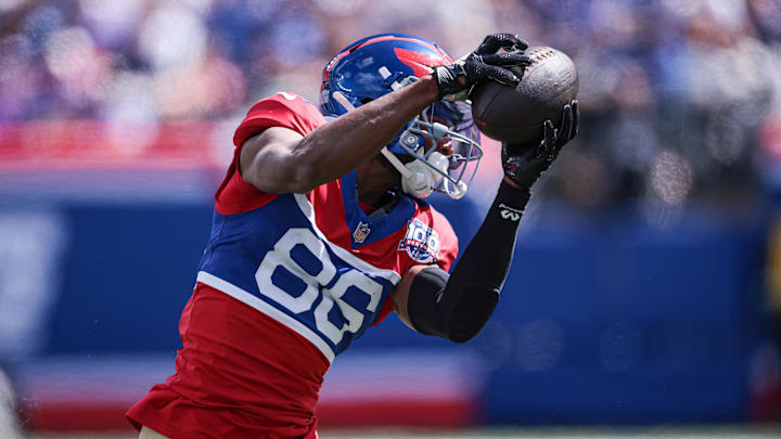 Sep 8, 2024; East Rutherford, New Jersey, USA; New York Giants wide receiver Darius Slayton (86) catches the ball during the first half against the Minnesota Vikings at MetLife Stadium. Mandatory Credit: Vincent Carchietta-Imagn Images Sep 8, 2024; East Rutherford, New Jersey, USA; New York Giants wide receiver Darius Slayton (86) catches the ball during the first half against the Minnesota Vikings at MetLife Stadium. Mandatory Credit: Vincent Carchietta-Imagn Images
