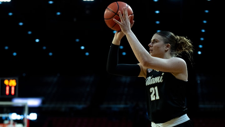 Miami RedHawks forward Ilse de Vries (21) hits a 3-point basket in the first quarter of the NCAA Basketball game against the Ohio Bobcats at Millett Hall in Oxford, Ohio, on Saturday, January 31, 2026.
