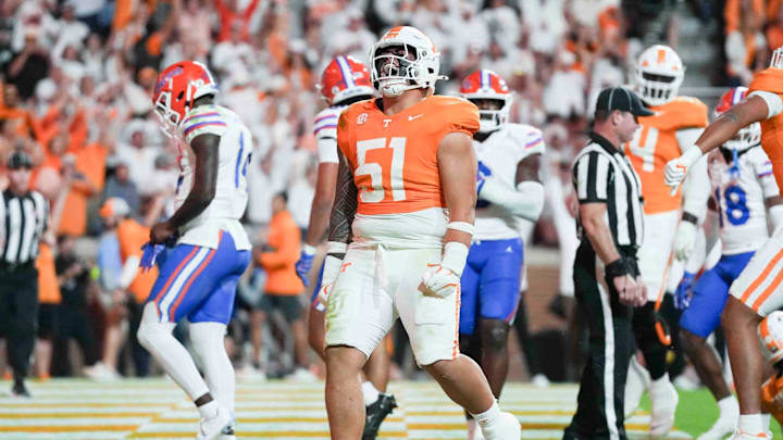 Tennessee defensive lineman Jaxson Moi (51) celebrates after a touchdown by Tennessee running back Dylan Sampson (6) during a game between Florida and Tennessee in Neyland Stadium, in Knoxville, Tenn., Saturday, Oct. 12, 2024. Tennessee defensive lineman Jaxson Moi (51) celebrates after a touchdown by Tennessee running back Dylan Sampson (6) during a game between Florida and Tennessee in Neyland Stadium, in Knoxville, Tenn., Saturday, Oct. 12, 2024.