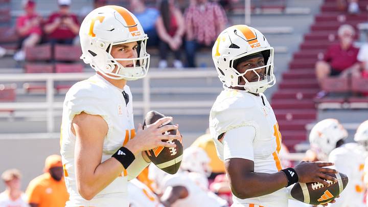 Tennessee quarterback George MacIntyre (12) and Tennessee quarterback Faizon Brandon (11) before a college football game between Tennessee and Arkansas at Donald W. Reynolds Razorback Stadium in Fayetteville, Ark., on Oct. 10, 2026. Tennessee quarterback George MacIntyre (12) and Tennessee quarterback Faizon Brandon (11) before a college football game between Tennessee and Arkansas at Donald W. Reynolds Razorback Stadium in Fayetteville, Ark., on Oct. 10, 2026.