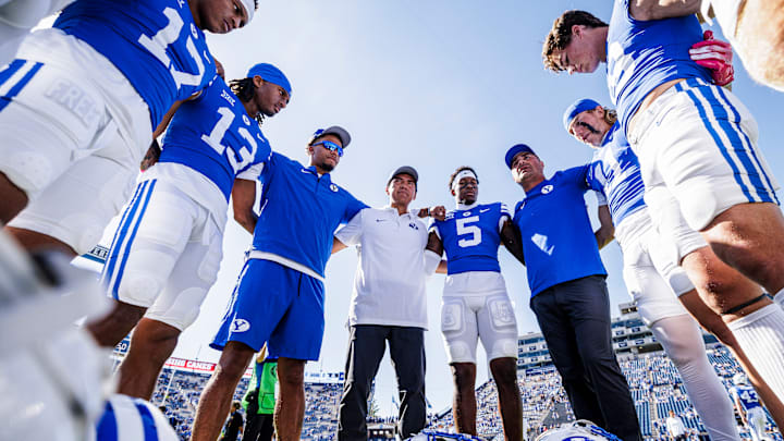 BYU wide receivers with coach Fesi Sitake ahead of home game against Arizona