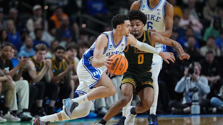 Mar 19, 2026; Greenville, SC, USA; Duke Blue Devils guard Darren Harris (8) moves the ball during a first round game of the men's 2026 NCAA Tournament at Bon Secours Wellness Arena. Mandatory Credit: Jim Dedmon-Imagn Images