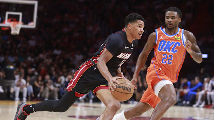 Dec 20, 2024; Miami, Florida, USA; Oklahoma City Thunder guard Cason Wallace (22) defends Miami Heat guard Dru Smith (12) during the second half at Kaseya Center. Mandatory Credit: Rhona Wise-Imagn Images Dec 20, 2024; Miami, Florida, USA; Oklahoma City Thunder guard Cason Wallace (22) defends Miami Heat guard Dru Smith (12) during the second half at Kaseya Center. Mandatory Credit: Rhona Wise-Imagn Images