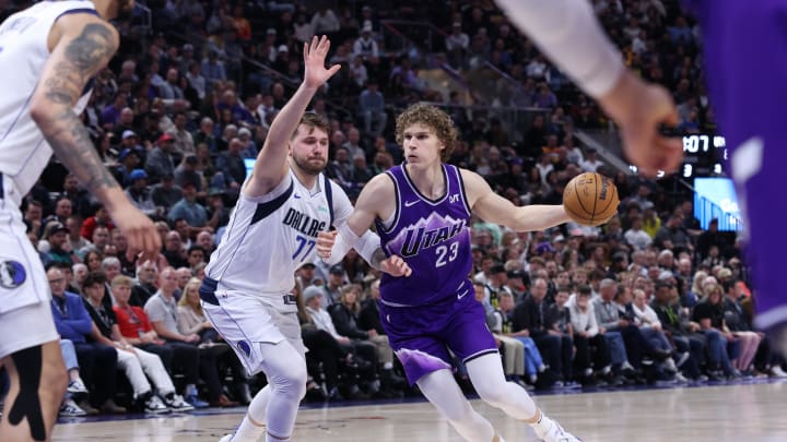 Mar 25, 2024; Salt Lake City, Utah, USA; Utah Jazz forward Lauri Markkanen (23) drives against Dallas Mavericks guard Luka Doncic (77) during the third quarter at Delta Center. Mandatory Credit: Rob Gray-USA TODAY Sports Mar 25, 2024; Salt Lake City, Utah, USA; Utah Jazz forward Lauri Markkanen (23) drives against Dallas Mavericks guard Luka Doncic (77) during the third quarter at Delta Center. Mandatory Credit: Rob Gray-USA TODAY Sports