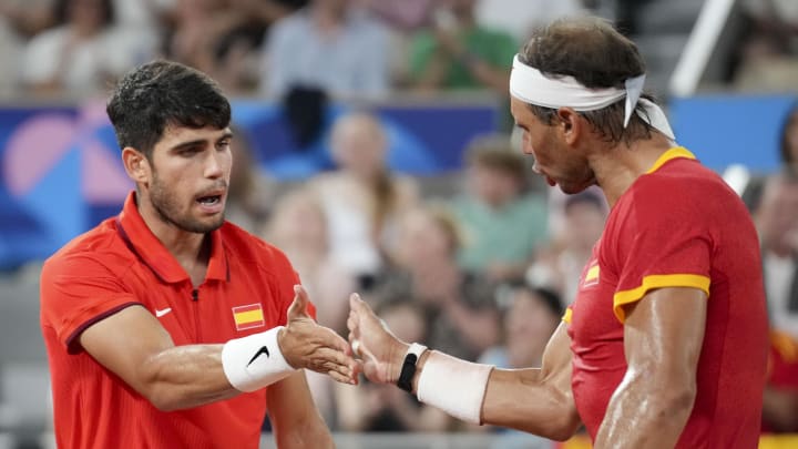 Rafael Nadal encouraged Carlos Alcaraz after his Olympics loss.