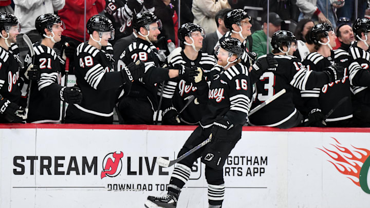 Apr 12, 2026; Newark, New Jersey, USA; New Jersey Devils right wing Connor Brown (16) celebrates with teammates after scoring a goal against the Ottawa Senators during the first period at Prudential Center. Mandatory Credit: John Jones-Imagn Images