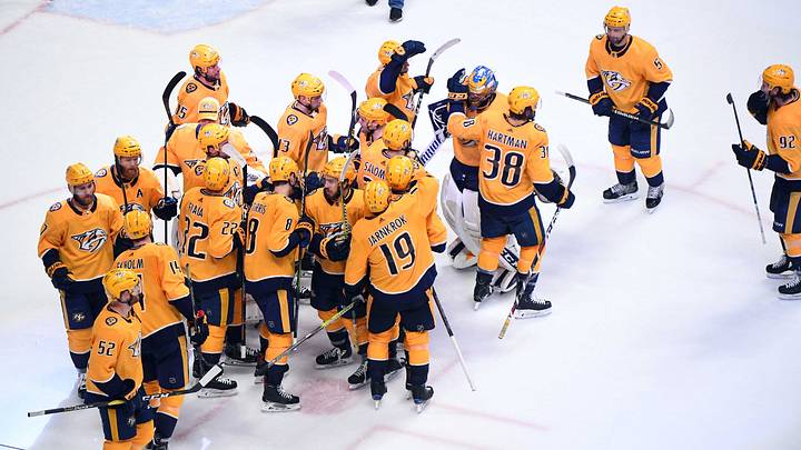 Dec 13, 2018; Nashville, TN, USA; Nashville Predators players celebrate after a game-winning goal by Nashville Predators center Colton Sissons (10) in overtime against the Vancouver Canucks at Bridgestone Arena. Mandatory Credit: Christopher Hanewinckel-USA TODAY Sports Dec 13, 2018; Nashville, TN, USA; Nashville Predators players celebrate after a game-winning goal by Nashville Predators center Colton Sissons (10) in overtime against the Vancouver Canucks at Bridgestone Arena. Mandatory Credit: Christopher Hanewinckel-USA TODAY Sports