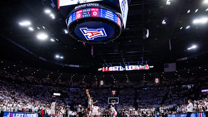Jan 27, 2025; Tucson, Arizona, USA; Arizona Wildcats forward Tobe Awaka (30) and Iowa State center Dishon Jackson (1) jump for tip off at McKale Center. Mandatory Credit: Aryanna Frank-Imagn Images