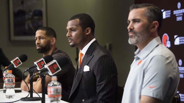 Mar 25, 2022; Berea, OH, USA; Cleveland Browns quarterback Deshaun Watson, center, general manager Andrew Berry, left, and head coach Kevin Stefanski talk with the media during a press conference at the CrossCountry Mortgage Campus. Mandatory Credit: Ken Blaze-Imagn Images