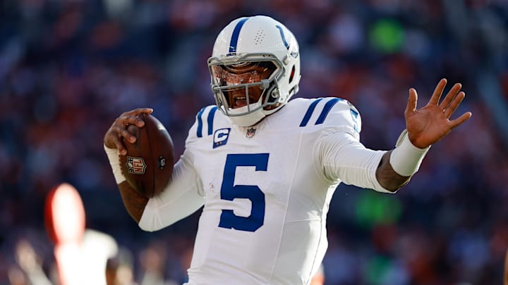 Dec 15, 2024; Denver, Colorado, USA; Indianapolis Colts quarterback Anthony Richardson (5) runs for a touchdown in the first quarter against the Denver Broncos at Empower Field at Mile High. Dec 15, 2024; Denver, Colorado, USA; Indianapolis Colts quarterback Anthony Richardson (5) runs for a touchdown in the first quarter against the Denver Broncos at Empower Field at Mile High.