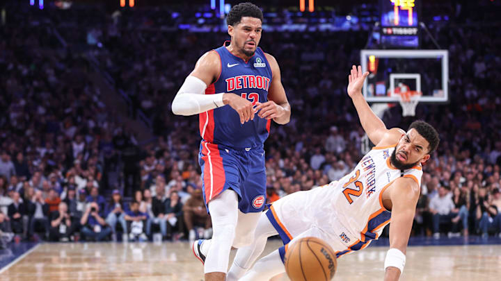 Apr 29, 2025; New York, New York, USA; Detroit Pistons forward Tobias Harris (12) collides with New York Knicks center Karl-Anthony Towns (32) in the second quarter during game five of first round for the 2025 NBA Playoffs at Madison Square Garden. Mandatory Credit: Wendell Cruz-Imagn Images