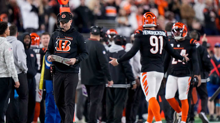Cincinnati Bengals head coach Zac Taylor walks the sideline as the defense returns after giving up a touchdown in the fourth quarter of the NFL Week 17 game between the Cincinnati Bengals and the Denver Broncos at Paycor Stadium in downtown Cincinnati on Saturday, Dec. 28, 2024. The Bengals took a 30-24 win in overtime to remain in the post season chase.