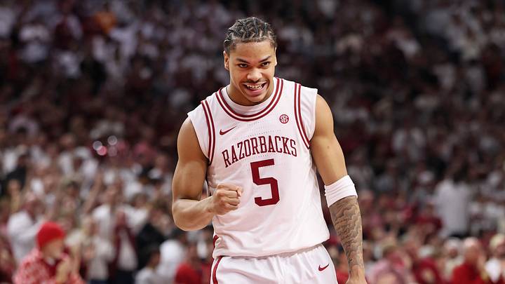 Jan 3, 2026; Fayetteville, Arkansas, USA; Arkansas Razorbacks guard Darius Acuff Jr (5) celebrates after a foul call against the Tennessee Volunteers during the second half at Bud Walton Arena.  Mandatory Credit: Nelson Chenault-Imagn Images