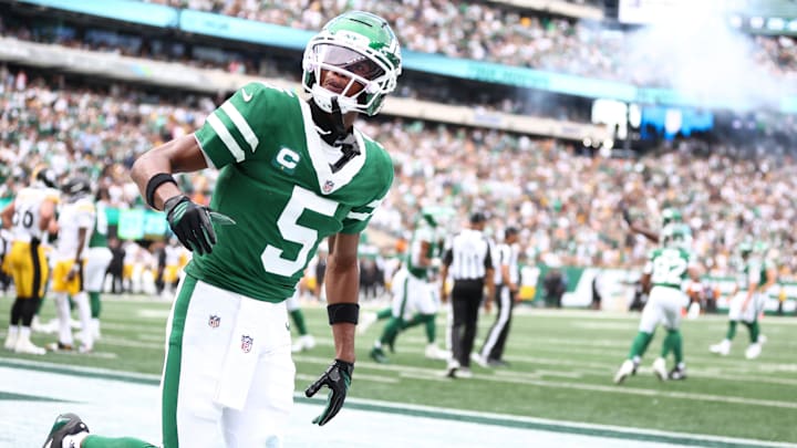 Sep 7, 2025; East Rutherford, New Jersey, USA; New York Jets wide receiver Garrett Wilson (5) celebrates during the second half against the Pittsburgh Steelers at MetLife Stadium. Mandatory Credit: Wendell Cruz-Imagn Images
