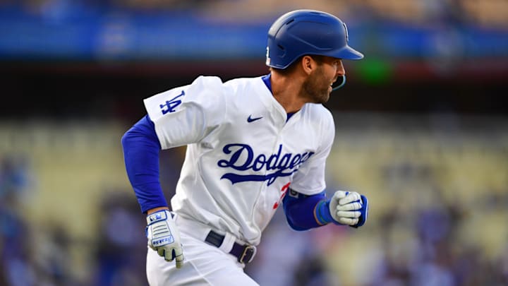 Mar 31, 2024; Los Angeles, California, USA; Los Angeles Dodgers left fielder Chris Taylor (3) hits a single against the St. Louis Cardinals during the second inning at Dodger Stadium. Mar 31, 2024; Los Angeles, California, USA; Los Angeles Dodgers left fielder Chris Taylor (3) hits a single against the St. Louis Cardinals during the second inning at Dodger Stadium.