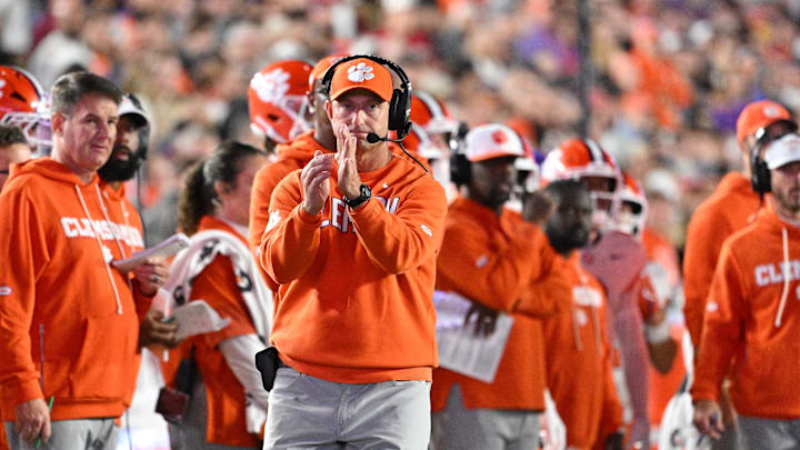 Oct 11, 2025; Chestnut Hill, Massachusetts, USA; Clemson Tigers head coach Dabo Swinney calls time out during the first half against the Boston College Eagles at Alumni Stadium. Mandatory Credit: Eric Canha-Imagn Images