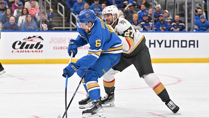 Oct 22, 2026; St. Louis, Missouri, USA;  Vegas Golden Knights defenseman Shea Theodore (27) pressures St. Louis Blues defenseman Philip Broberg (6) during the second period at Enterprise Center.  Mandatory Credit: Jeff Le-Imagn Images
