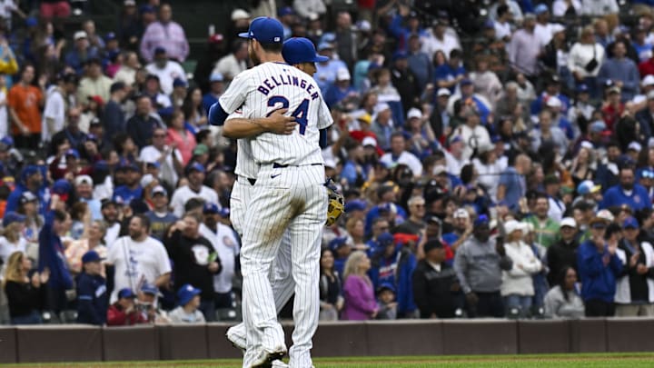 Sep 28, 2024; Chicago, Illinois, USA;  Chicago Cubs outfielder Cody Bellinger (24) hugs third baseman Isaac Paredes (17) after a game against the Cincinnati Reds at Wrigley Field. Mandatory Credit: Matt Marton-Imagn Images