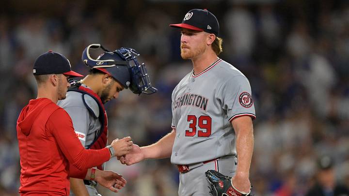 Sep 5, 2026; Los Angeles, California, USA; Washington Nationals pitcher Clayton Beeter (39) is relieved by manager Blake Butera during the seventh inning against the Los Angeles Dodgers at Dodger Stadium. Mandatory Credit: Jayne Kamin-Oncea-Imagn Images Sep 5, 2026; Los Angeles, California, USA; Washington Nationals pitcher Clayton Beeter (39) is relieved by manager Blake Butera during the seventh inning against the Los Angeles Dodgers at Dodger Stadium. Mandatory Credit: Jayne Kamin-Oncea-Imagn Images