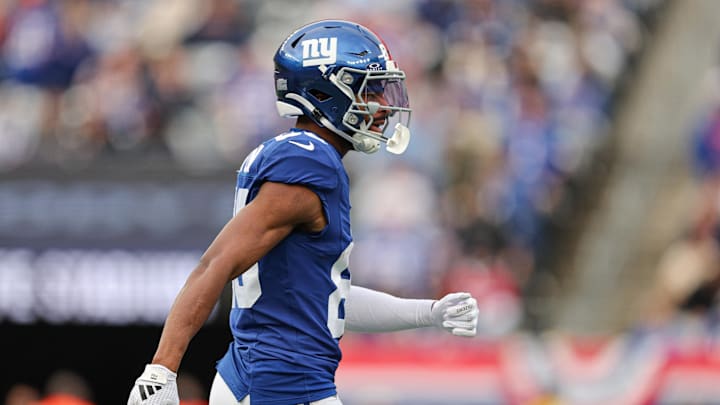 Dec 29, 2024; East Rutherford, New Jersey, USA; New York Giants wide receiver Darius Slayton (86) celebrates after scoring a touchdown reception during the first half against the Indianapolis Colts at MetLife Stadium. Mandatory Credit: Vincent Carchietta-Imagn Images