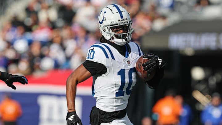 Dec 29, 2024; East Rutherford, New Jersey, USA; Indianapolis Colts wide receiver Adonai Mitchell (10) gains yards after catch during the first half against the New York Giants at MetLife Stadium. Dec 29, 2024; East Rutherford, New Jersey, USA; Indianapolis Colts wide receiver Adonai Mitchell (10) gains yards after catch during the first half against the New York Giants at MetLife Stadium.