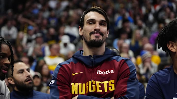 Feb 3, 2025; Denver, Colorado, USA; Denver Nuggets forward Dario Saric (9) on the bench in the second half against the New Orleans Pelicans at Ball Arena. Mandatory Credit: Ron Chenoy-Imagn Images