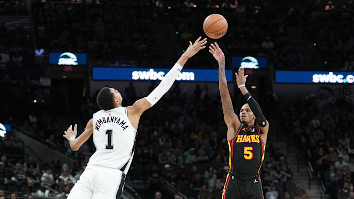 Nov 30, 2023; San Antonio, Texas, USA; Atlanta Hawks guard Dejounte Murray (5) shoots over Atlanta Nov 30, 2023; San Antonio, Texas, USA; Atlanta Hawks guard Dejounte Murray (5) shoots over Atlanta