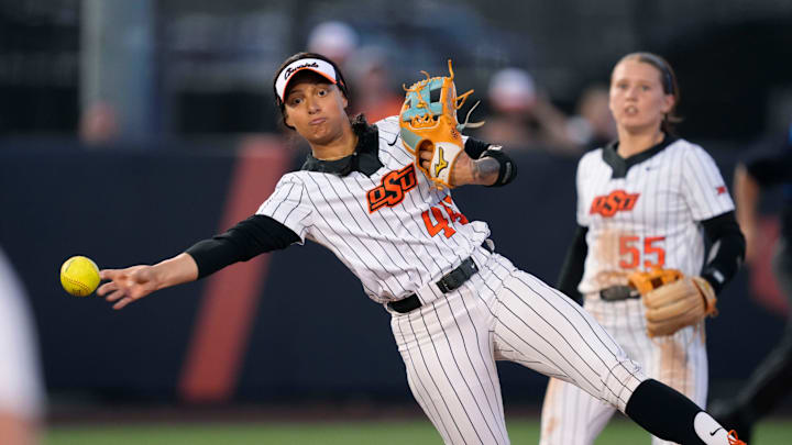 Oklahoma State's Tallen Edwards (44) throws to first for an out in the seventh inning of a college softball game between the Oklahoma State University Cowgirls (OSU) and the Baylor Bears in Stillwater, Okla., Friday, March 21, 2025.