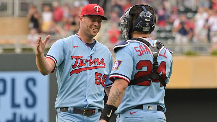 Aug 17, 2022; Minneapolis, Minnesota, USA; Minnesota Twins relief pitcher Trevor Megill (58) reacts with catcher Gary Sanchez (24) after the game against the Kansas City Royals at Target Field. Mandatory Credit: Jeffrey Becker-USA TODAY Sports