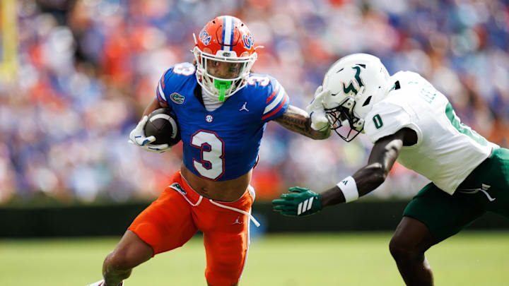 Sep 6, 2025; Gainesville, Florida, USA; Florida Gators wide receiver Eugene Wilson III (3) runs against South Florida Bulls cornerback Jarvis Lee (0) during the first half at Ben Hill Griffin Stadium. Mandatory Credit: Matt Pendleton-Imagn Images