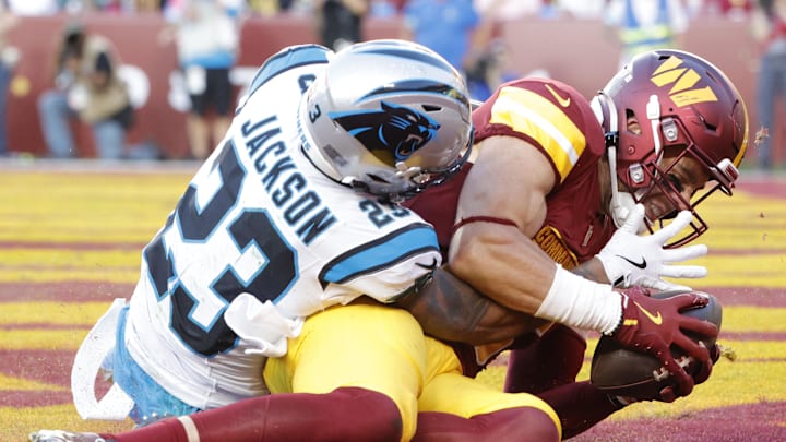 Oct 20, 2024; Landover, Maryland, USA; Washington Commanders tight end Zach Ertz (86) catches a touchdown pass as Carolina Panthers cornerback Dane Jackson (23) defends during the second quarter at Northwest Stadium. Mandatory Credit: Amber Searls-Imagn Images Oct 20, 2024; Landover, Maryland, USA; Washington Commanders tight end Zach Ertz (86) catches a touchdown pass as Carolina Panthers cornerback Dane Jackson (23) defends during the second quarter at Northwest Stadium. Mandatory Credit: Amber Searls-Imagn Images