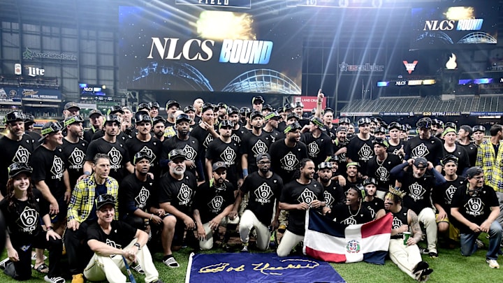 Oct 11, 2025; Milwaukee, Wisconsin, USA; The Milwaukee Brewers celebrate on the field after defeating the Chicago Cubs in game five of the NLDS round for the 2025 MLB playoffs at American Family Field. Mandatory Credit: Benny Sieu-Imagn Images